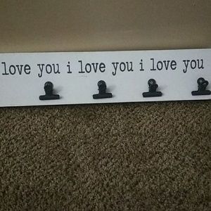 A photo holder. Wall art.